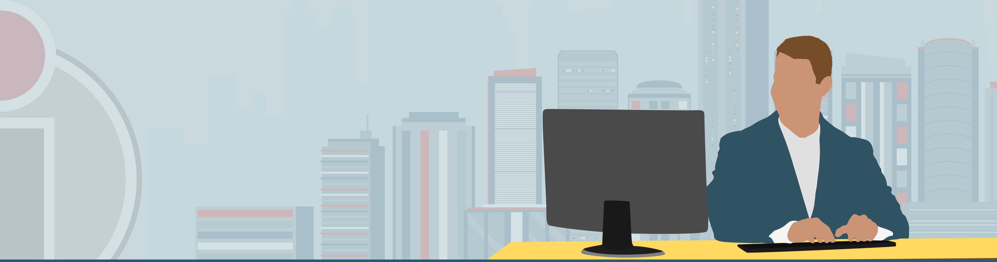 person at desk viewing monitor screen